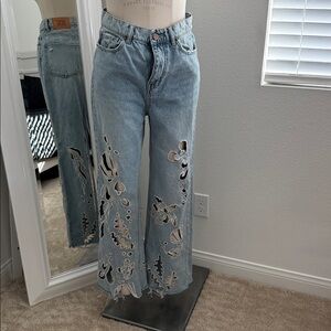 BDG Light Blue Flare Jeans with Artistic Patterns